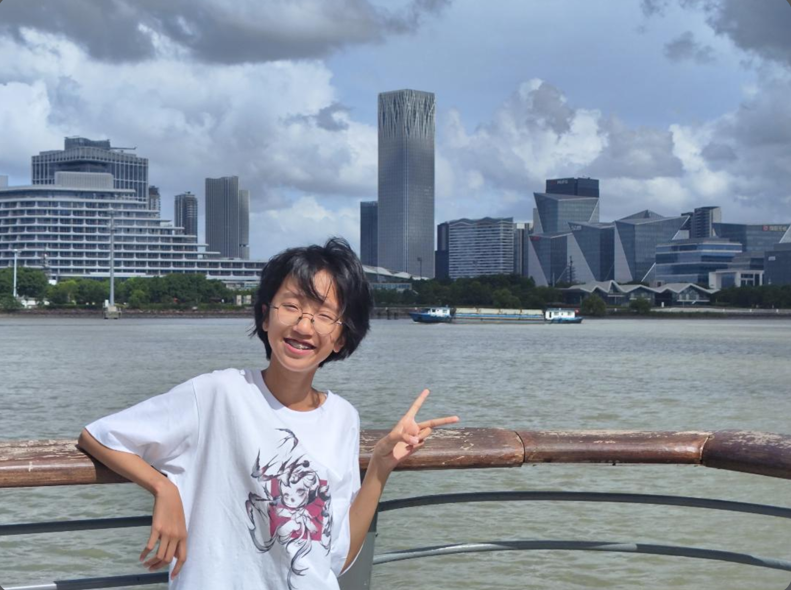 Saqira smiling on the waterfront